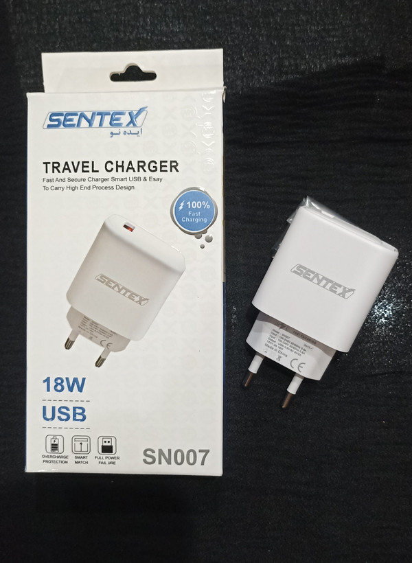 کلگی شارژر مسافرتی شارژر سریع و ایمن، USB هوشمند و حمل آسان، طراحی پیشرفته برند سنتکس مدلSN007 توان 18w با گارانکی یکساله هک شده روی محصول